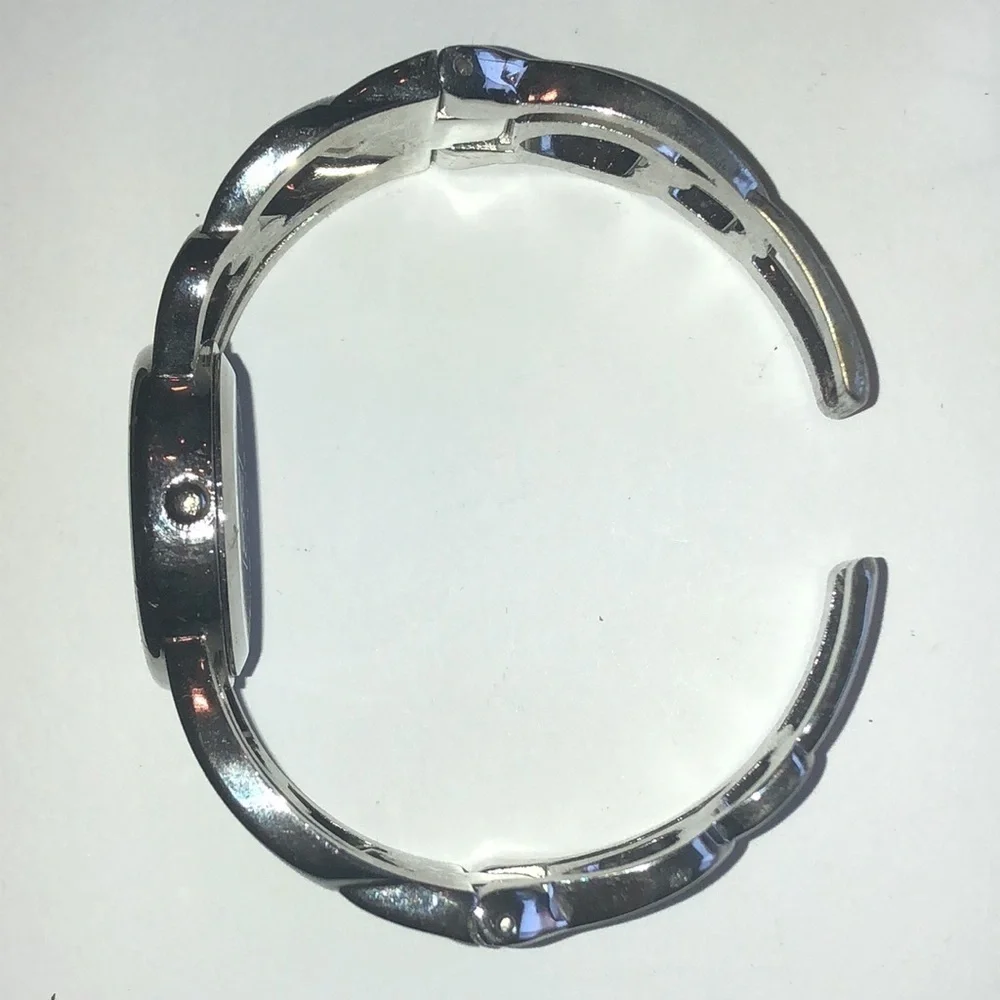 NY & Co. Silver Tone Cutout Cuff Band Watch Wristwatch NEW BATTERY